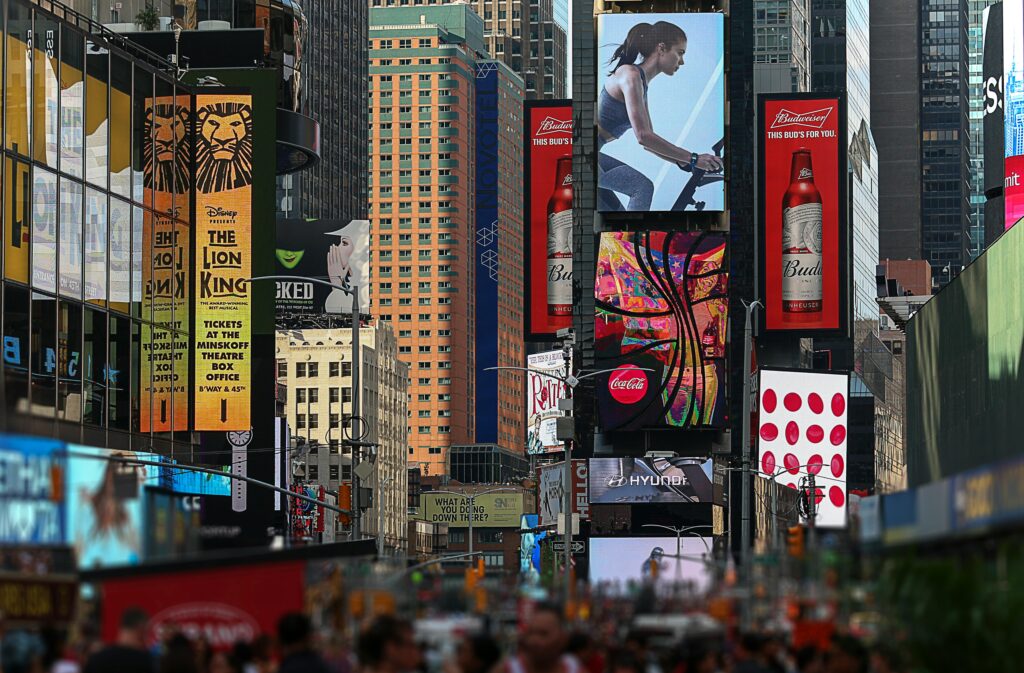 Colorful billboards and bustling crowds capture the essence of Times Square, NYC.